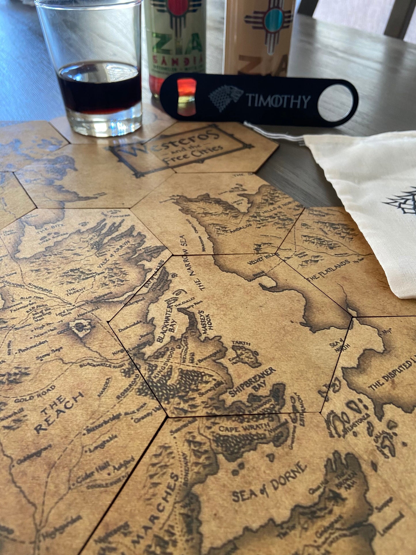 GOT Inspired Coaster Map Set with Black Stainless Steel Bottle Opener and Drawstring Bag
